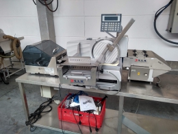 S.A.M. Meat Cutting and packaging machine